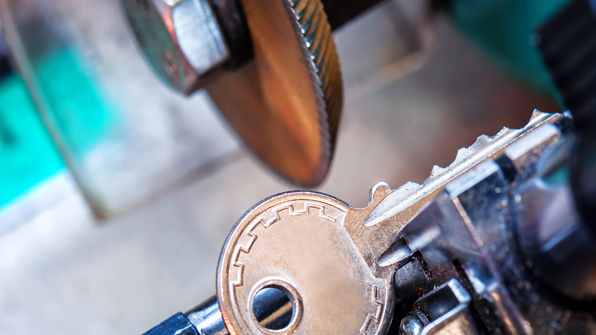 Locksmith re-programmed a smart key and is handing it to a client in Long Island, NY.